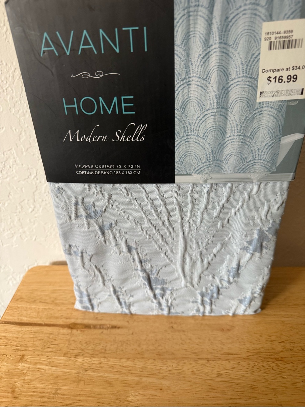 Avanti Modern Shells Shower Curtain in Light Blue.